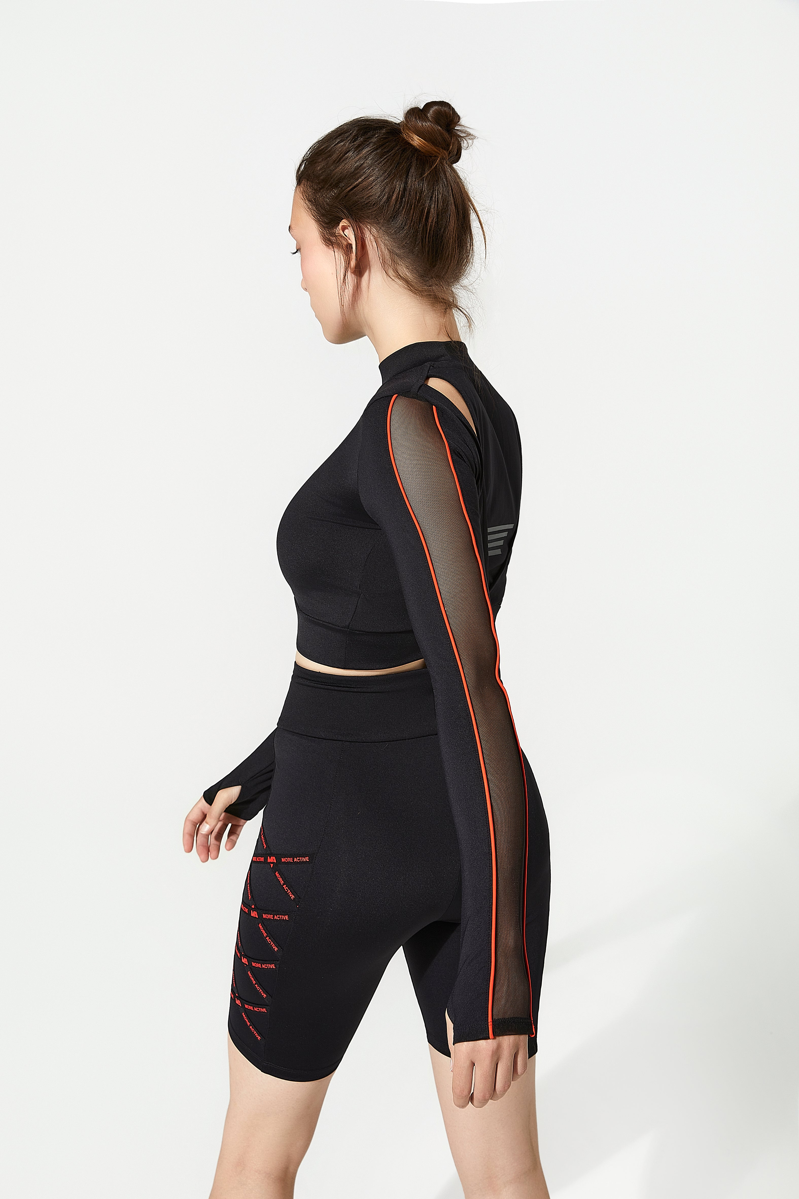 Black athletic activewear women outfit with mesh panels